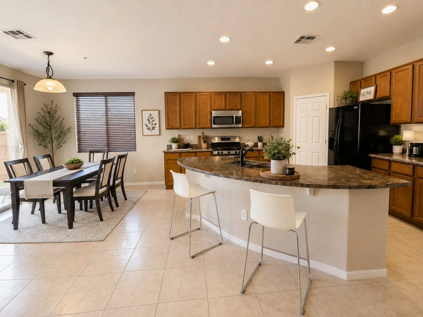 Open kitchen and dining area at Hopi Homes